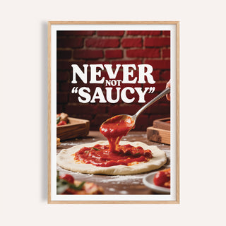 Framed print of pizza sauce being spooned onto dough with a red brick background and white text