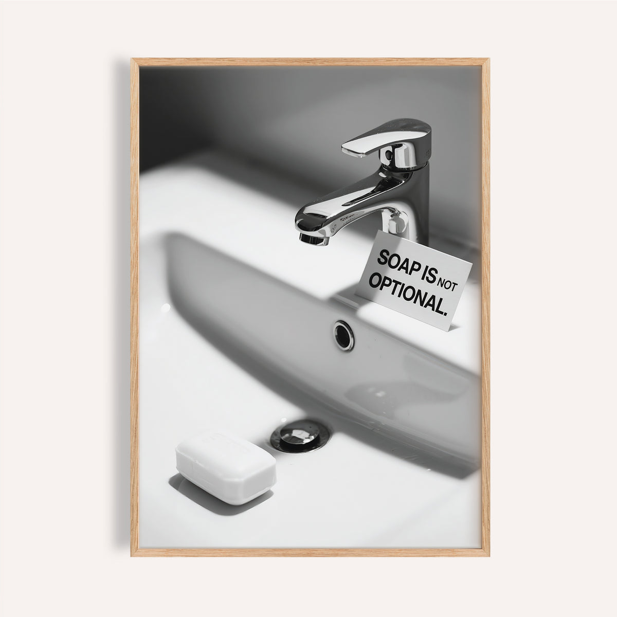Modern wash hands sign with chrome faucet and bold soap reminder.
