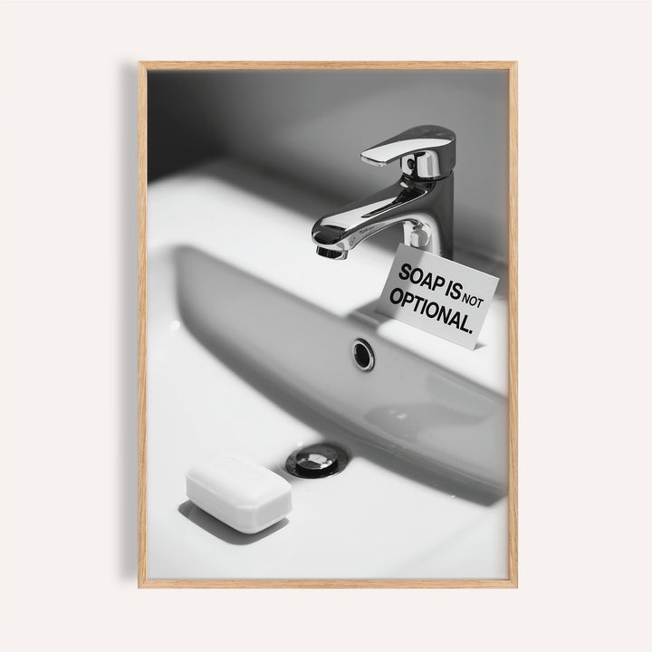 Modern wash hands sign with chrome faucet and bold soap reminder.