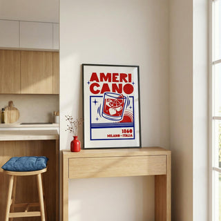 Framed 'AmeriCano' cocktail poster on a wall in a kitchen setting