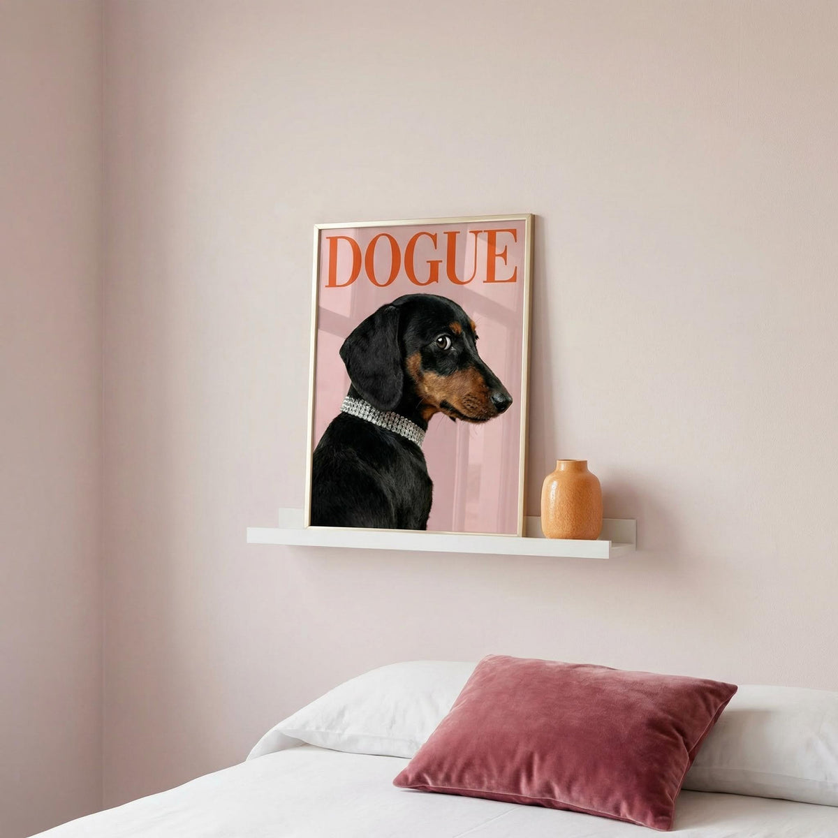 Framed artwork of a dog with 'DOGUE' text on a wall above a bed.