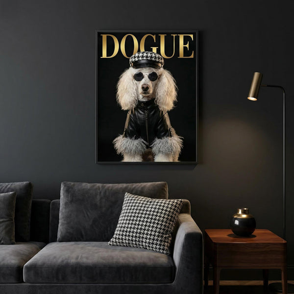 Framed artwork of a dog with 'DOGUE' text above a gray sofa in a living room.