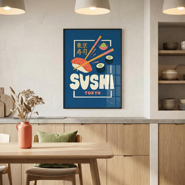 Framed sushi-themed artwork on a wall above a dining table in a modern kitchen.