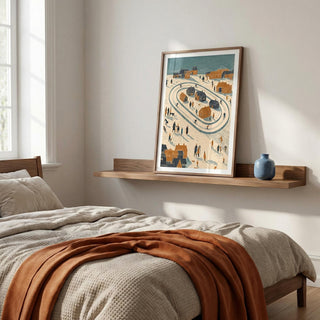 Framed artwork of a skiing village on a wooden shelf above a bed in a bedroom.