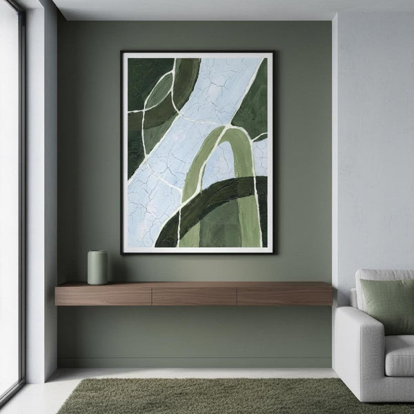 Modern interior with abstract art on a gray wall, wooden shelf, and gray sofa.