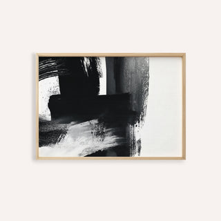 Minimalist Black and White Print in a wooden frame on a white wall