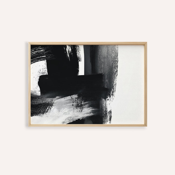 Minimalist Black and White Print in a wooden frame on a white wall