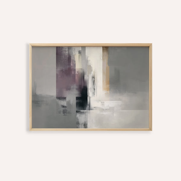 Abstract art piece with a gold frame on a white wall