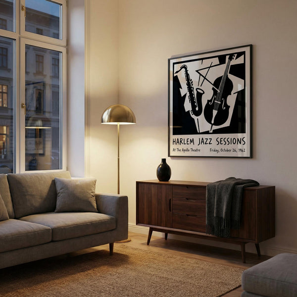 Living room with a gray sofa, wooden cabinet, and 'Harlem Jazz Sessions' poster on the wall.