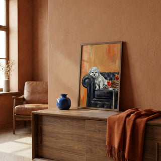Living room with a painting of a dog on an armchair, a vase, and a blanket.