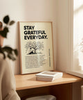 Motivational wall art with bold Stay Grateful text
