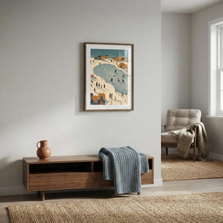 Living room with wooden cabinet, vase, and framed artwork on a wall.