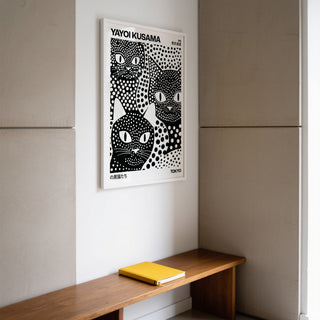Vibrant cat wall art with polka dot details