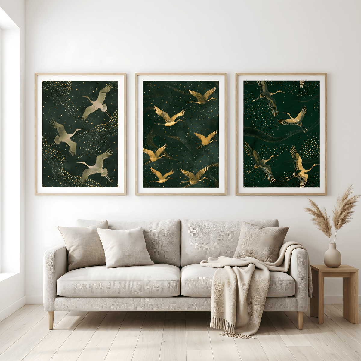 Living room with a beige sofa, decorative pillows, and three framed artworks of birds on a green background.