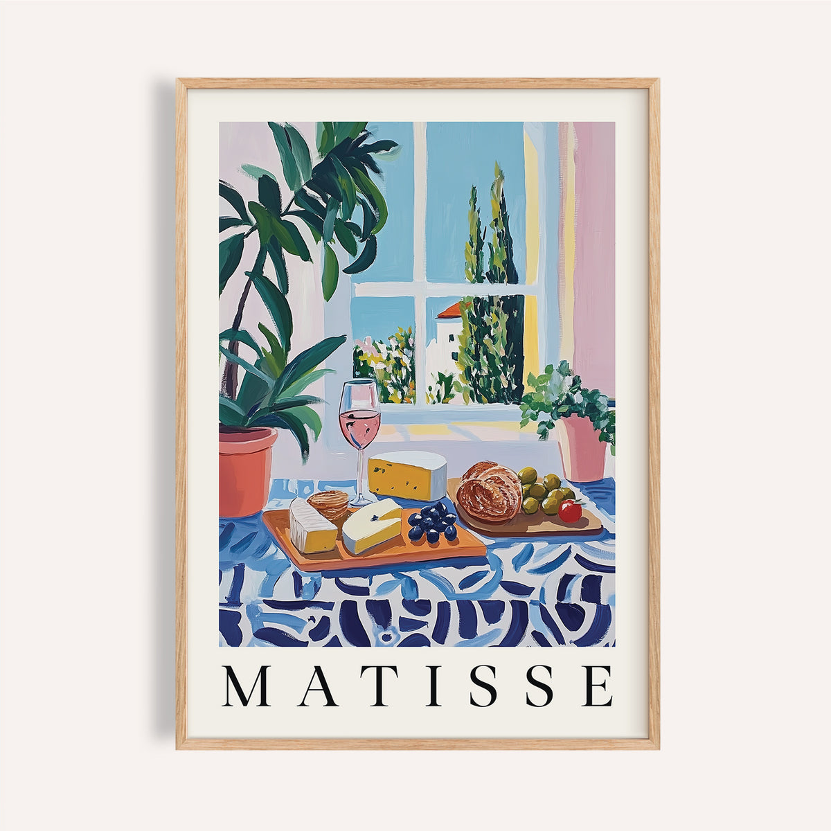 French prints artwork with bread, cheese, and rosé on a blue patterned table

