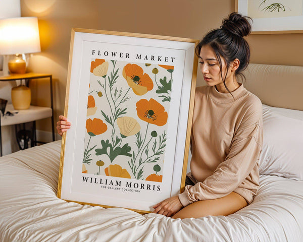 Elegant bedroom decor featuring framed orange flower pictures