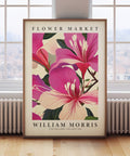 Botanical wall art featuring pink floral patterns by William Morris
