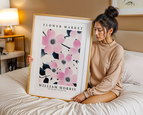 Pink floral poster with dark-centred blossoms
