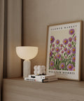 Modern botanical wall art with purple daisies
