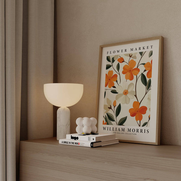 Living space styled with William Morris orange flower pictures