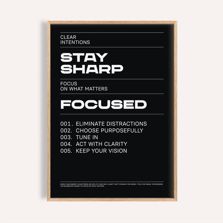 Bold black and white stay focused poster inspiring clarity