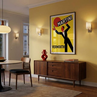 Modern interior with a wooden sideboard, chair, and decorative vase against a yellow wall with a framed Martini poster.