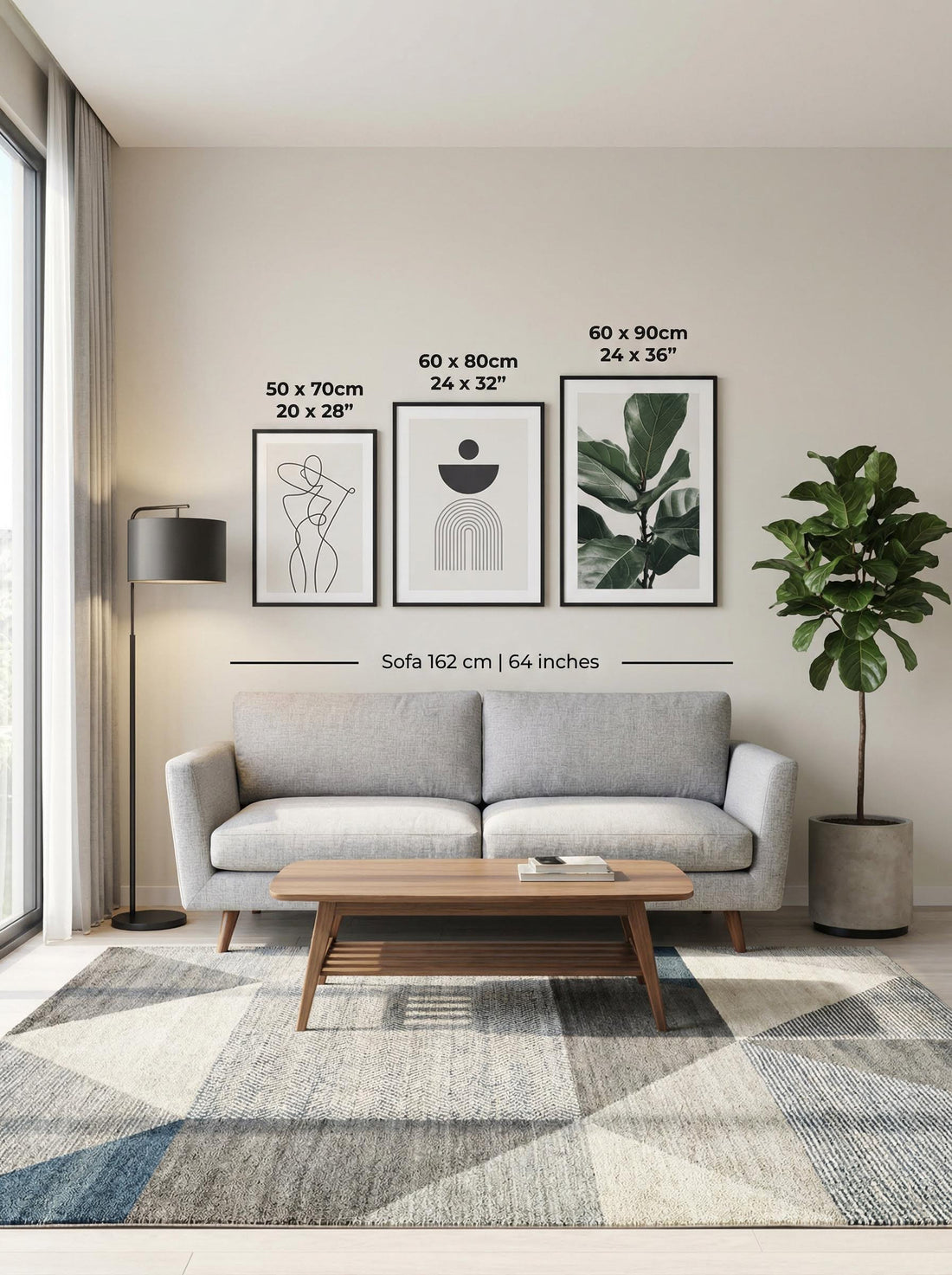 Three framed prints in 50x70, 60x80 and 60x90 cm above a grey sofa in a bright living room