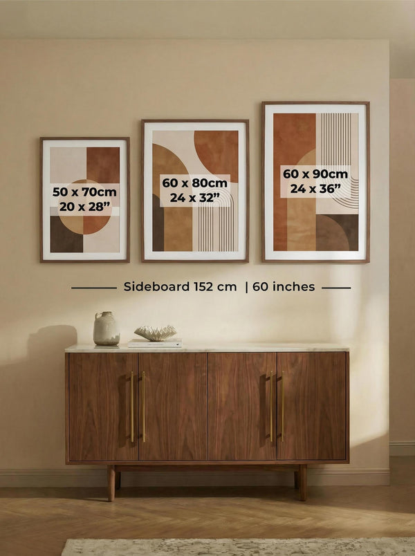 Medium Sized Frames above Sideboard in Hallway