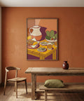 Dining room with a framed artwork on an orange wall, wooden table, chair, and bench.