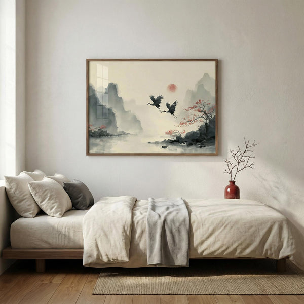 Framed artwork above a bed in a bedroom with minimal decor