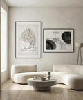 Minimalist abstract wall art set of 2 featuring flowing black and beige forms.