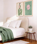 Minimalist set of 2 art prints in green and pink hues for modern decor.
