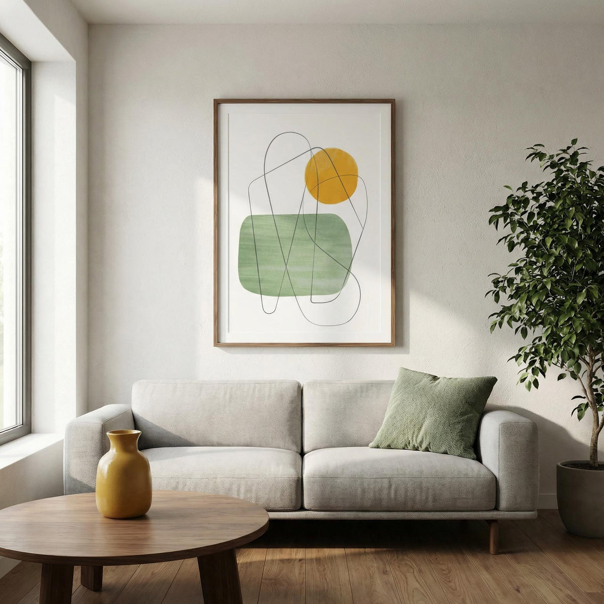 Modern living room with a gray sofa, abstract art, and a plant.