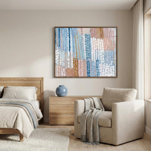 Modern bedroom with a bed, chair, and abstract painting on the wall.