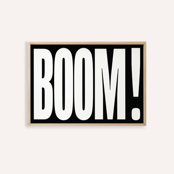 Modern typography wall art featuring bold BOOM design