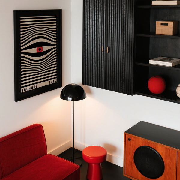 Striking abstract eye trippy wall art styled in a minimalist apartment