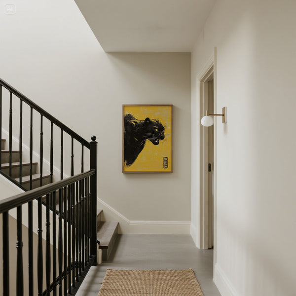 Staircase with black railing and a yellow Panther wall art in hallway.