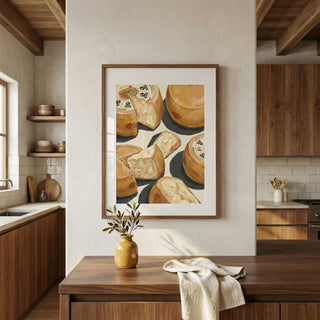 Kitchen interior with a framed picture of cheese on the wall