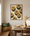 Dining room with wooden table, chairs, and a wall art piece of pasta.