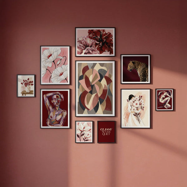 Set of ten art prints showing red, pink and purple abstract designs.