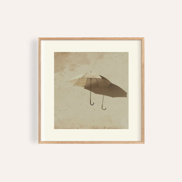 Beige-toned surrealism print of a vintage umbrella with dual shadows for hallway decor

