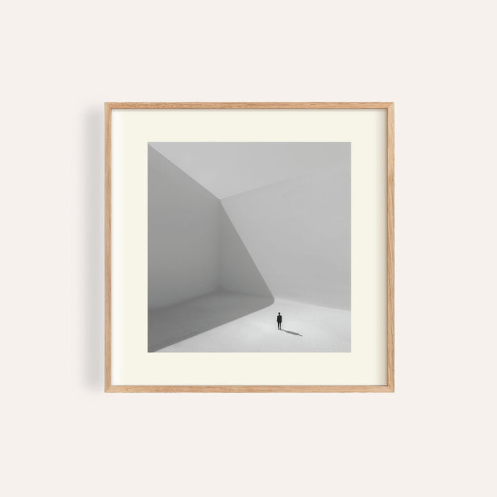 Minimalist square art prints with solitary figure for modern living room