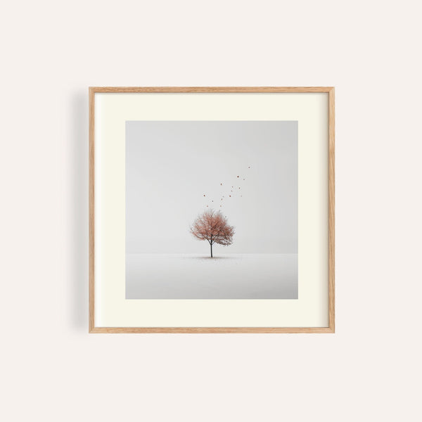 tree wall art featuring floating leaves