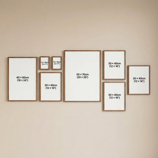 Set of picture frames with dimensions on a beige wall