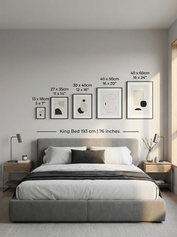 Bedroom with gray bed, nightstands, and wall measurements for art frames.