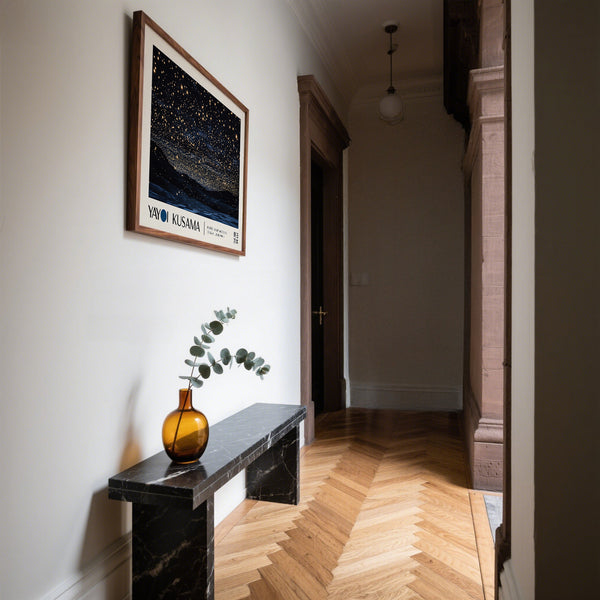 Entrance hallway Night Sky Art above marble sideboard