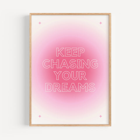 Inspirational quote print “Keep Chasing Your Dreams” with pink gradient background
