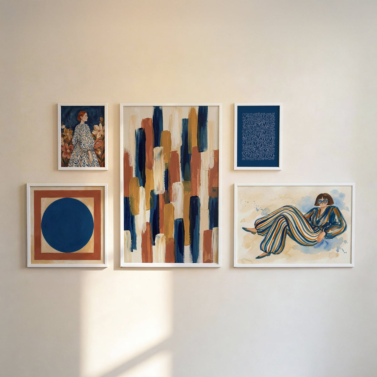 Modern Gallery Wall Set on a wall with abstract and portrait styles.