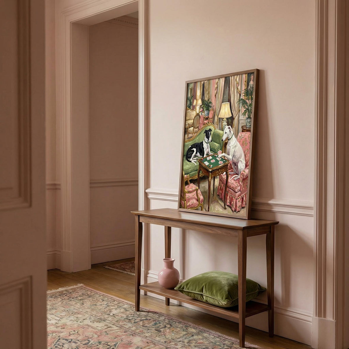 Decorative painting of dogs at a table on a wooden console table in a room with pink walls and a rug.