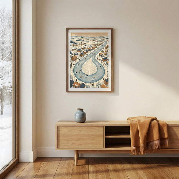 Framed winter artwork above a wooden cabinet with a vase and blanket in a room with a snowy view.